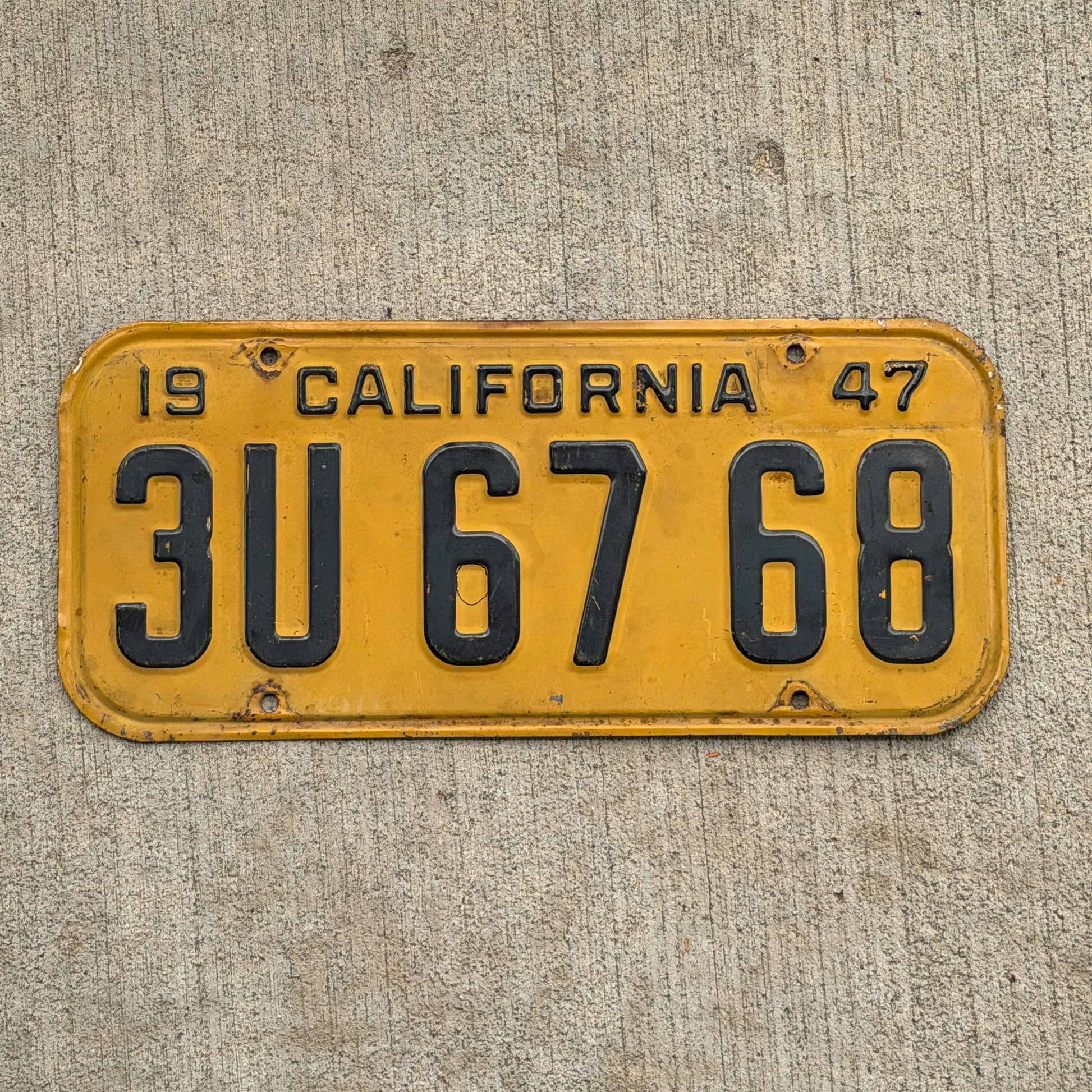 Photo of a 1947 California License Plate Auto Tag Garage Decor Vintage 3U 67 68 with original patina