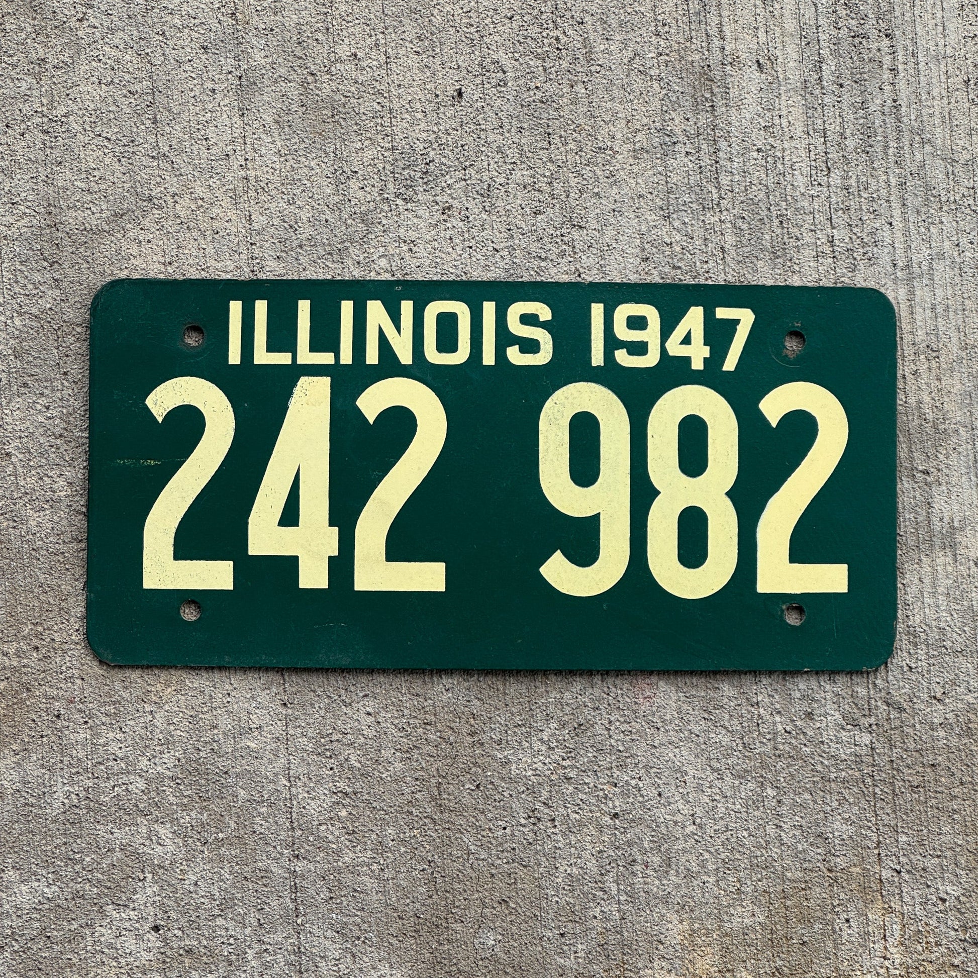 Photo of a 1947 Illinois Fiberboard License Plate Auto Tag Garage Decor Vintage High Quality 242 982 with original patina