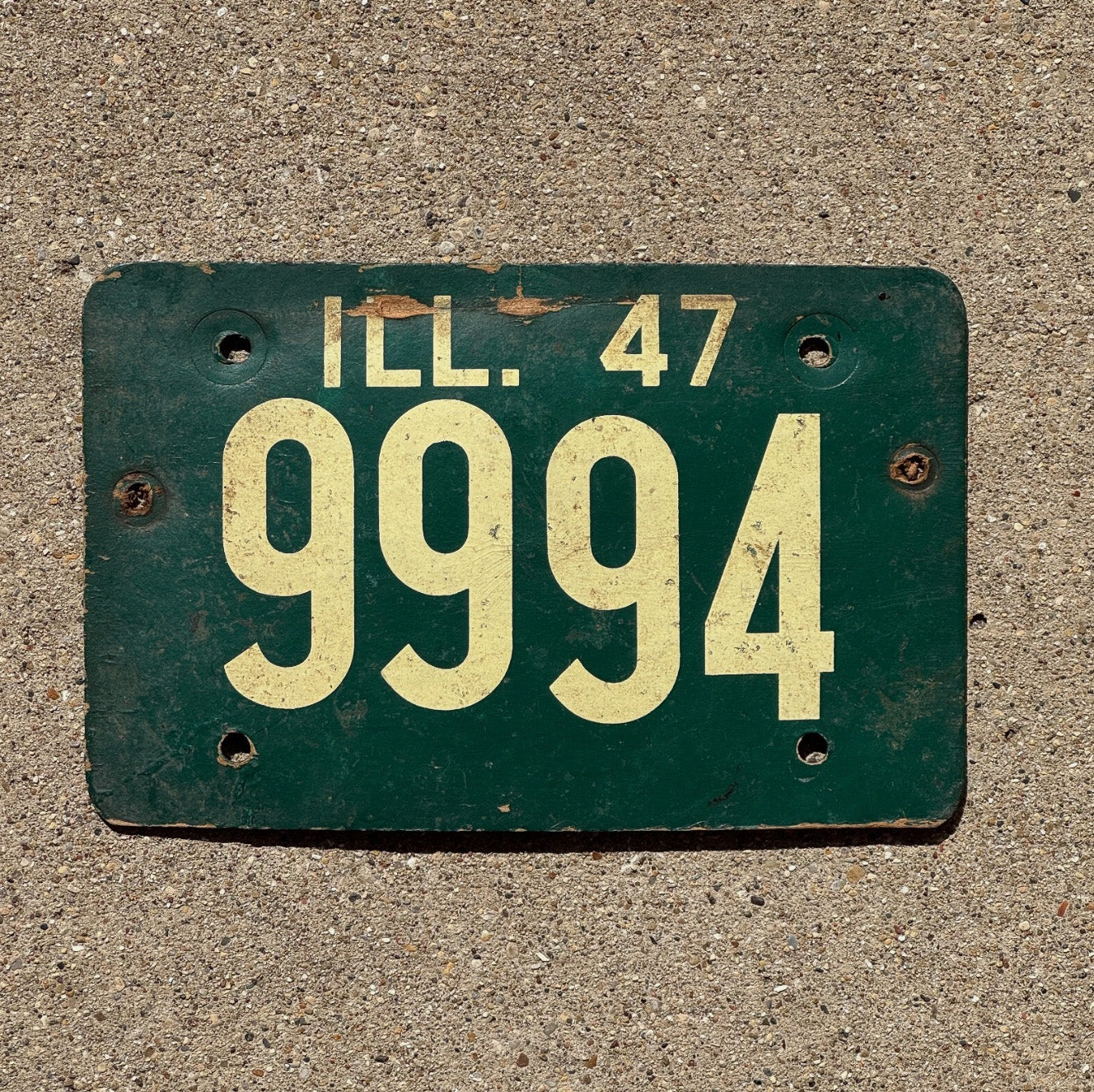 Photo of a 1947 Illinois Fiberboard License Plate Auto Tag Garage Decor Vintage Repeat Repeating 9994 with original patina