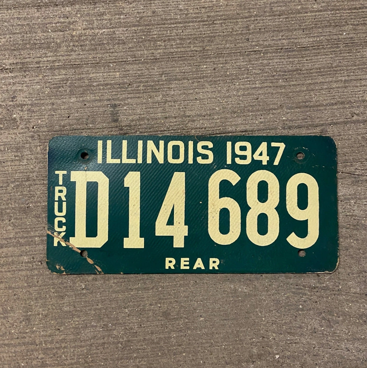 Photo of a 1947 Illinois Fiberboard Truck License Plate Auto Tag Garage Decor Vintage D 14689 with original patina