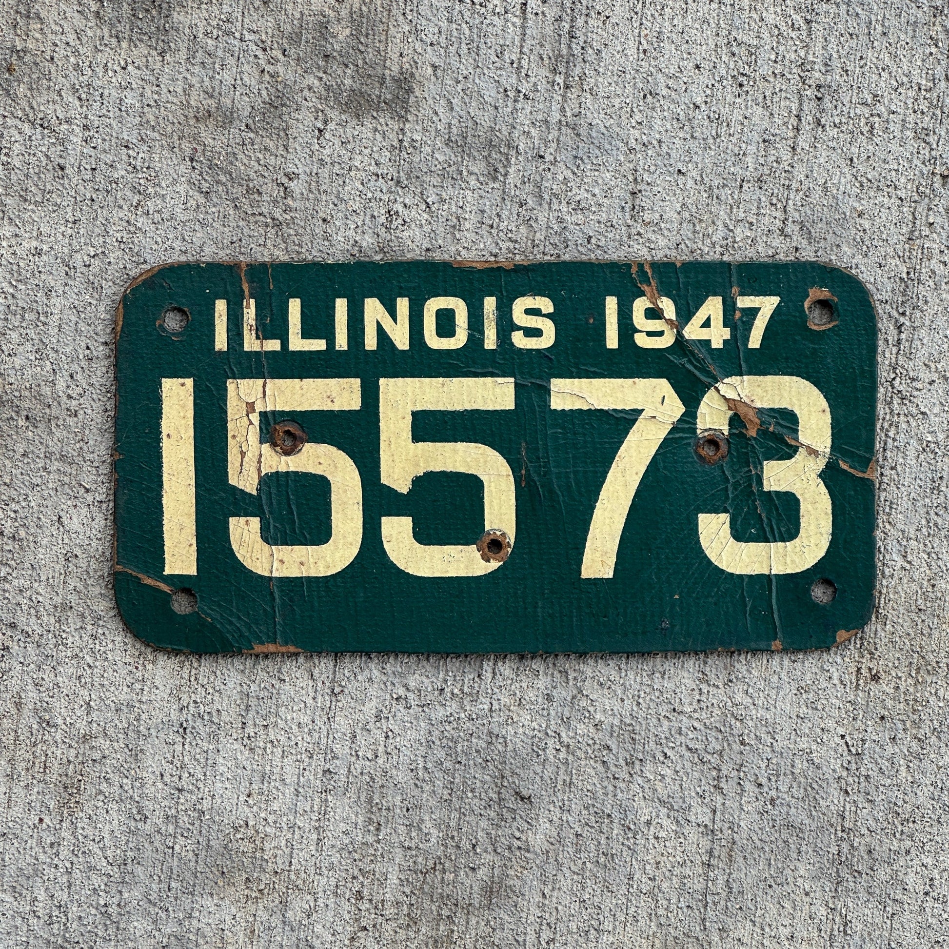 Photo of a 1947 Illinois Motorcycle License Plate Auto Tag Garage Decor Vintage Fiberboard 15573 with original patina