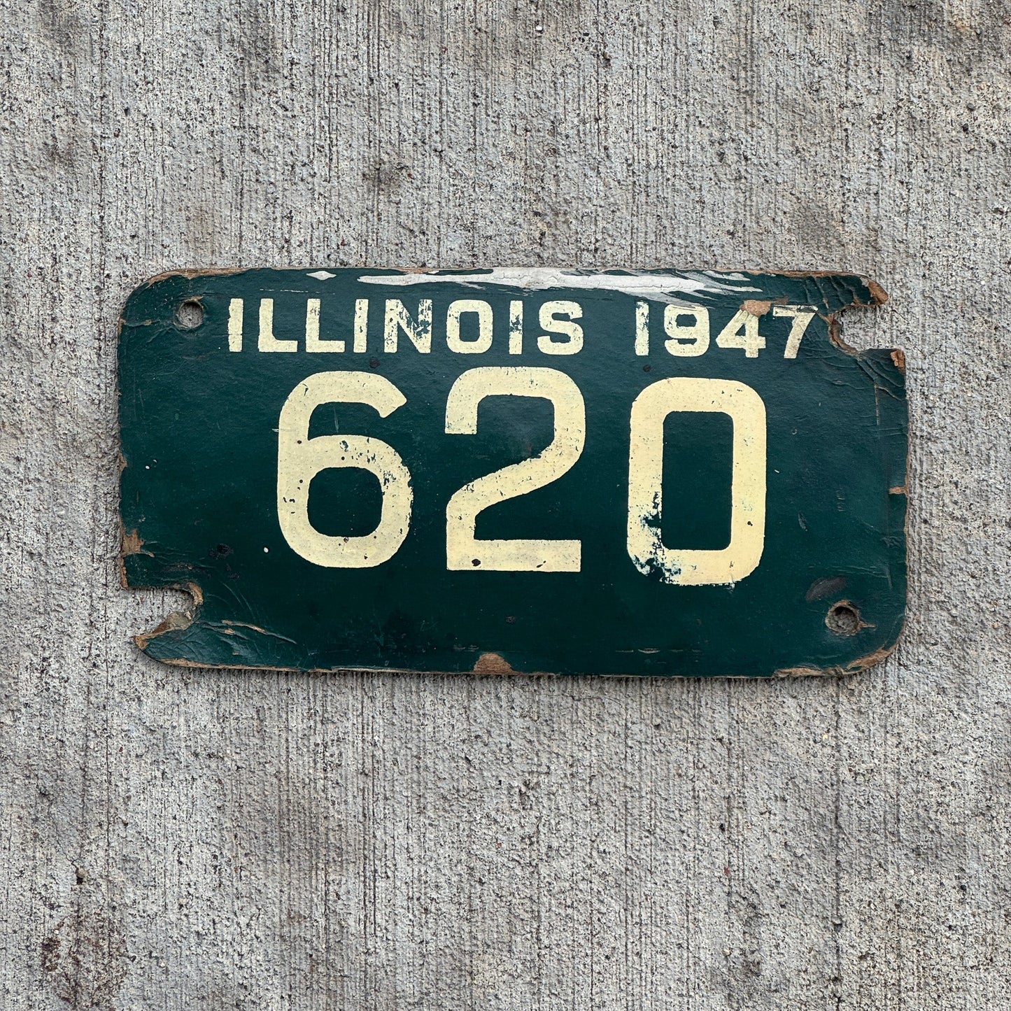 Photo of a 1947 Illinois Motorcycle License Plate Auto Tag Garage Decor Vintage Fiberboard Low Number Three Digit 620 with original patina