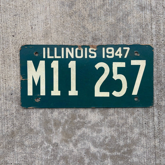 Photo of a 1947 Illinois Municipal License Plate Auto Tag Garage Decor Vintage Fiberboard M 11257 with original patina