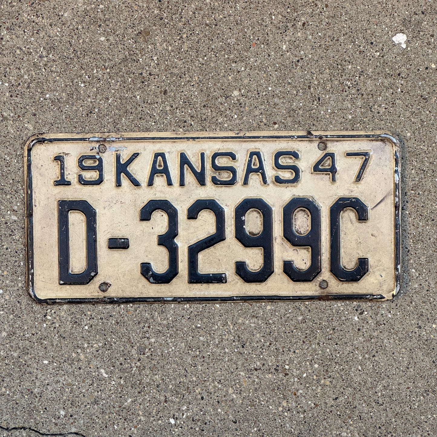 Photo of a 1947 Kansas Dealer License Plate Auto Tag Garage Decor Vintage D 3299 C with original patina