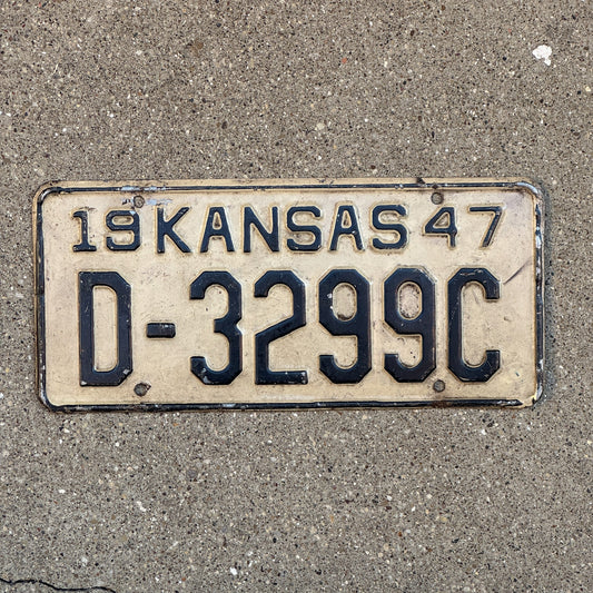 Photo of a 1947 Kansas Dealer License Plate Auto Tag Garage Decor Vintage D 3299 C with original patina