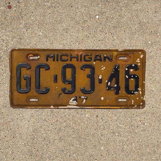 Photo of a 1947 Michigan License Plate Auto Tag Garage Decor Vintage GC 93 46 with original patina