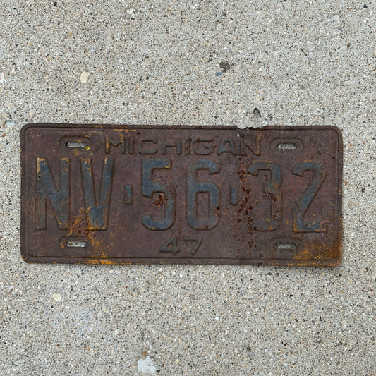 Photo of a 1947 Michigan License Plate Auto Tag Garage Decor Vintage NV 56 32 with original patina