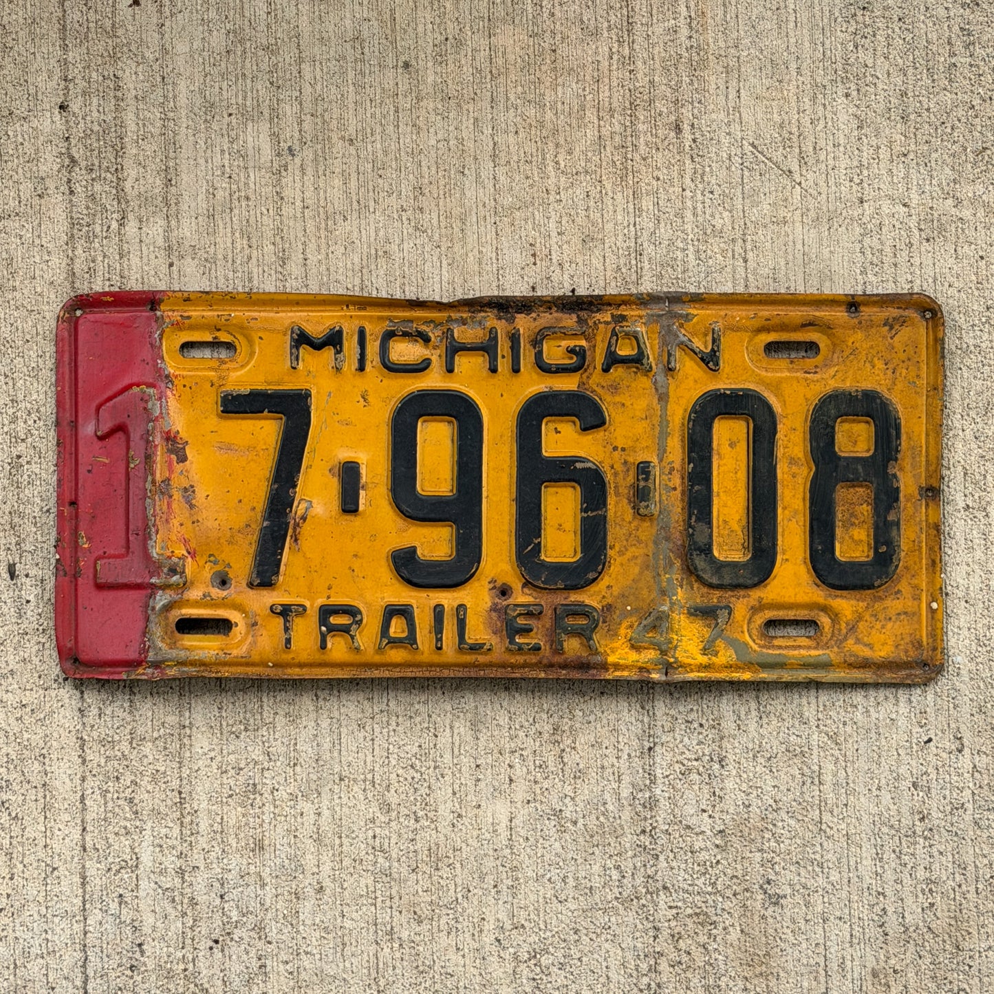 Photo of a 1947 Michigan Trailer License Plate Auto Tag Garage Decor Vintage 7 96 08 with original patina