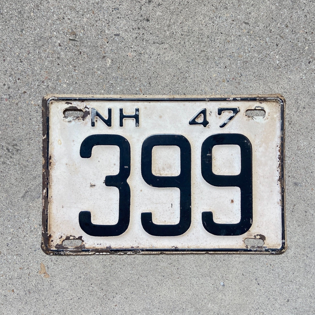 Photo of a 1947 New Hampshire License Plate Auto Tag Garage Decor Vintage Low Number Three Digit 399 with original patina