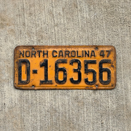 Photo of a 1947 North Carolina Dealer License Plate Auto Tag Garage Decor Vintage D 16356 with original patina