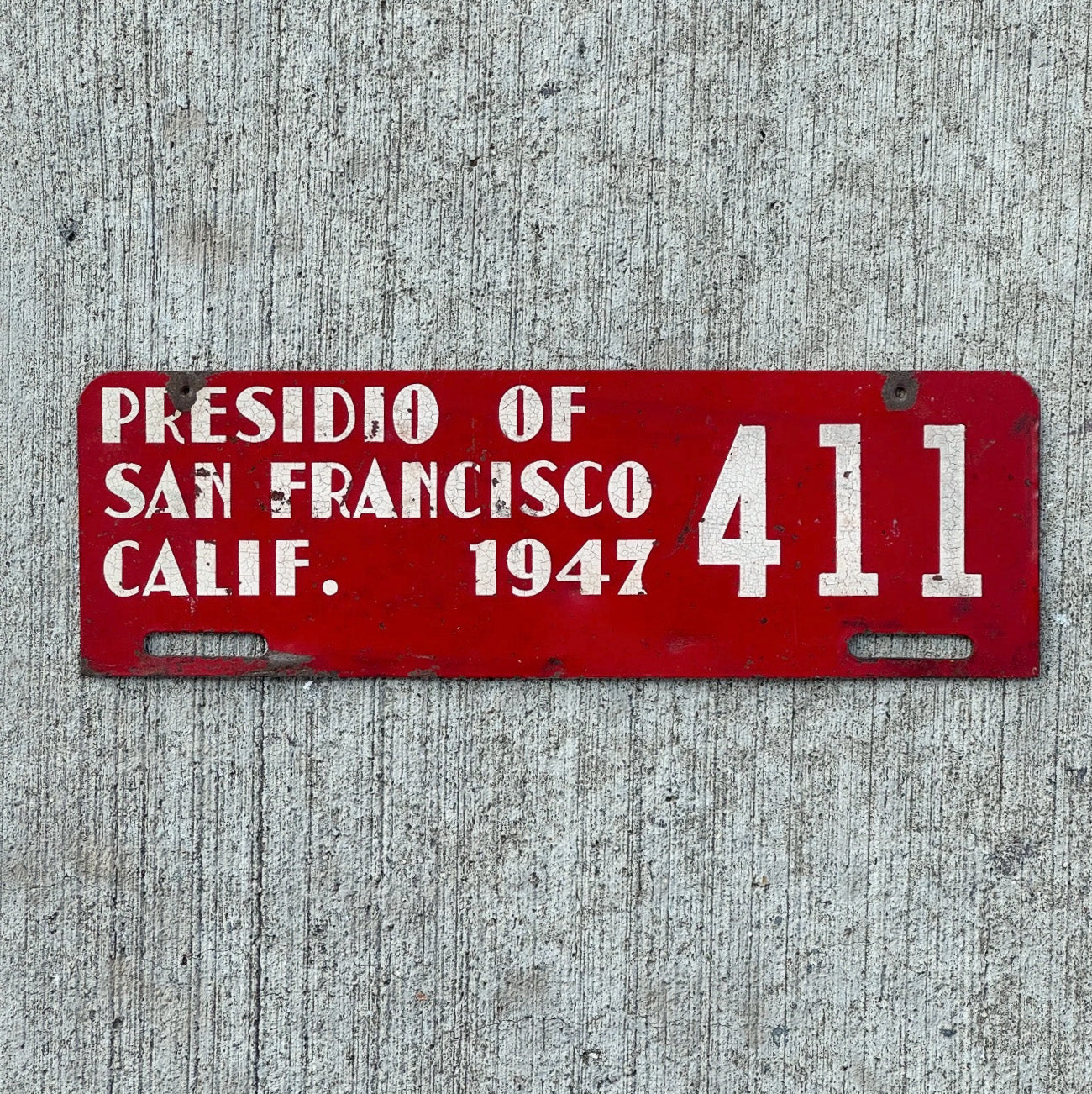 Photo of a 1947 Presidio of San Francisco California License Plate Topper Auto Tag Garage Decor Vintage Golden Gate 411 with original patina