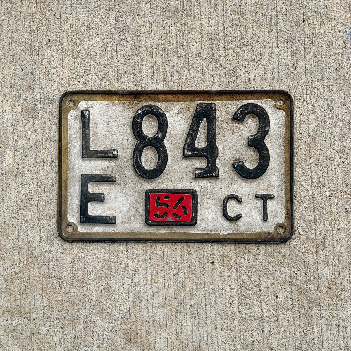 Photo of a 1948 1956 Connecticut License Plate Auto Tag 2 Vintage LE 843 with original patina
