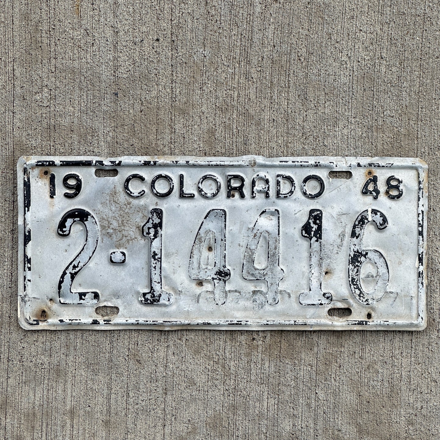 Photo of a 1948 Colorado License Plate Auto Tag Garage Decor Vintage 2 14416 with original patina