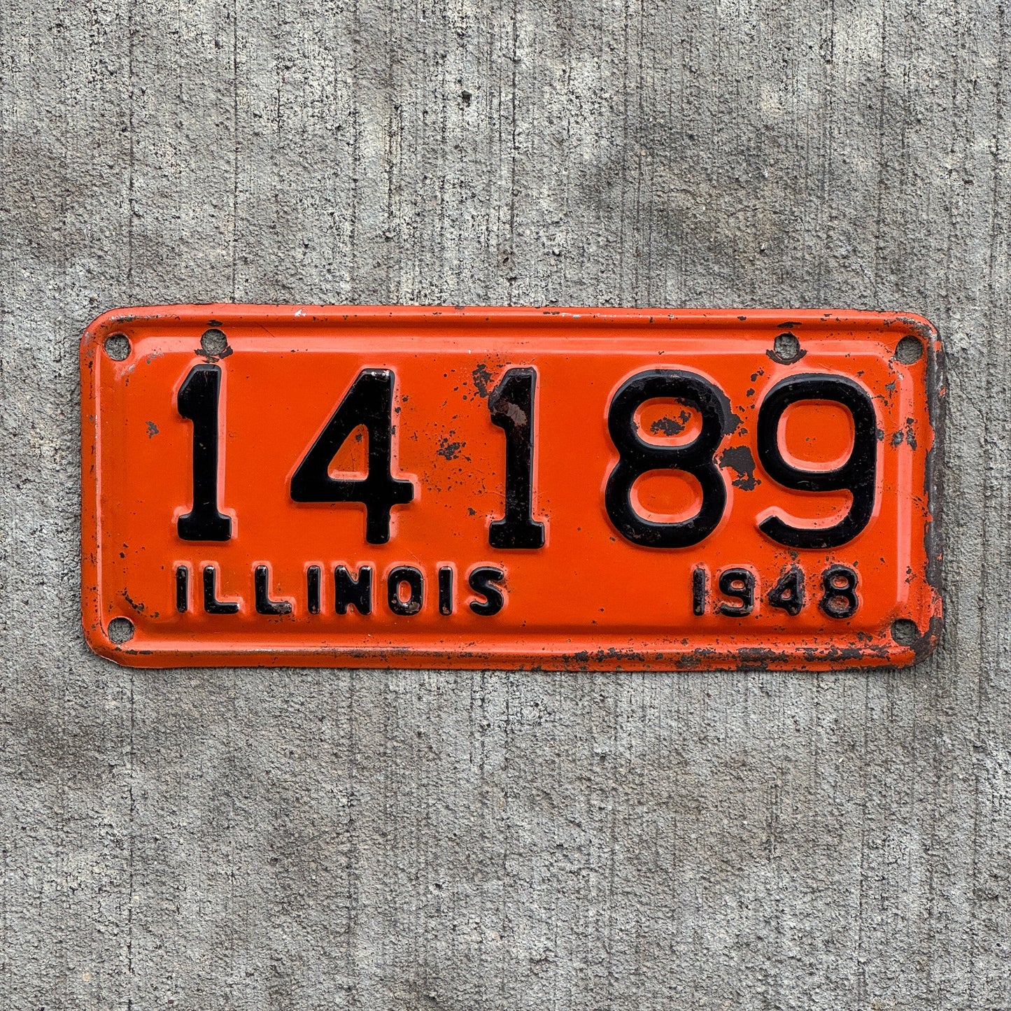 Photo of a 1948 Illinois Motorcycle License Plate Auto Tag Garage Decor Vintage 14189 with original patina