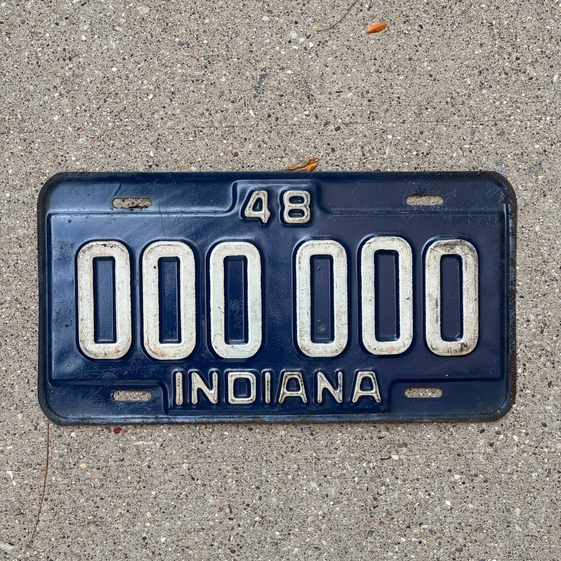 Photo of a 1948 Indiana Sample License Plate Auto Tag 3 Vintage 000 000 with original patina