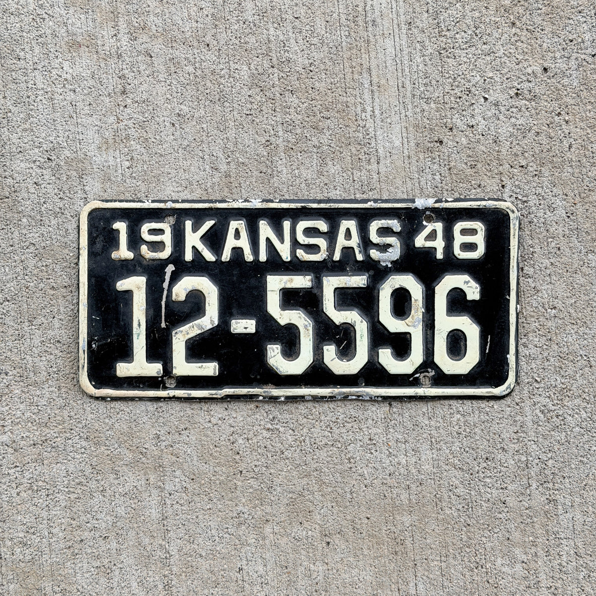 Photo of a 1948 Kansas License Plate Auto Tag Garage Decor Vintage 12 5596 with original patina