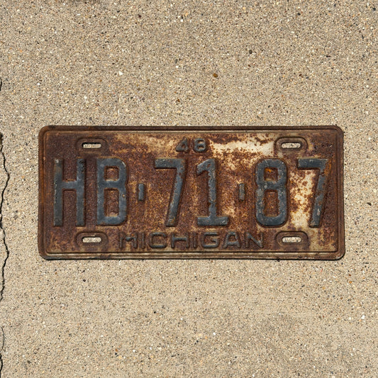 Photo of a 1948 Michigan License Plate Auto Tag Garage Decor Vintage HB 71 87 with original patina