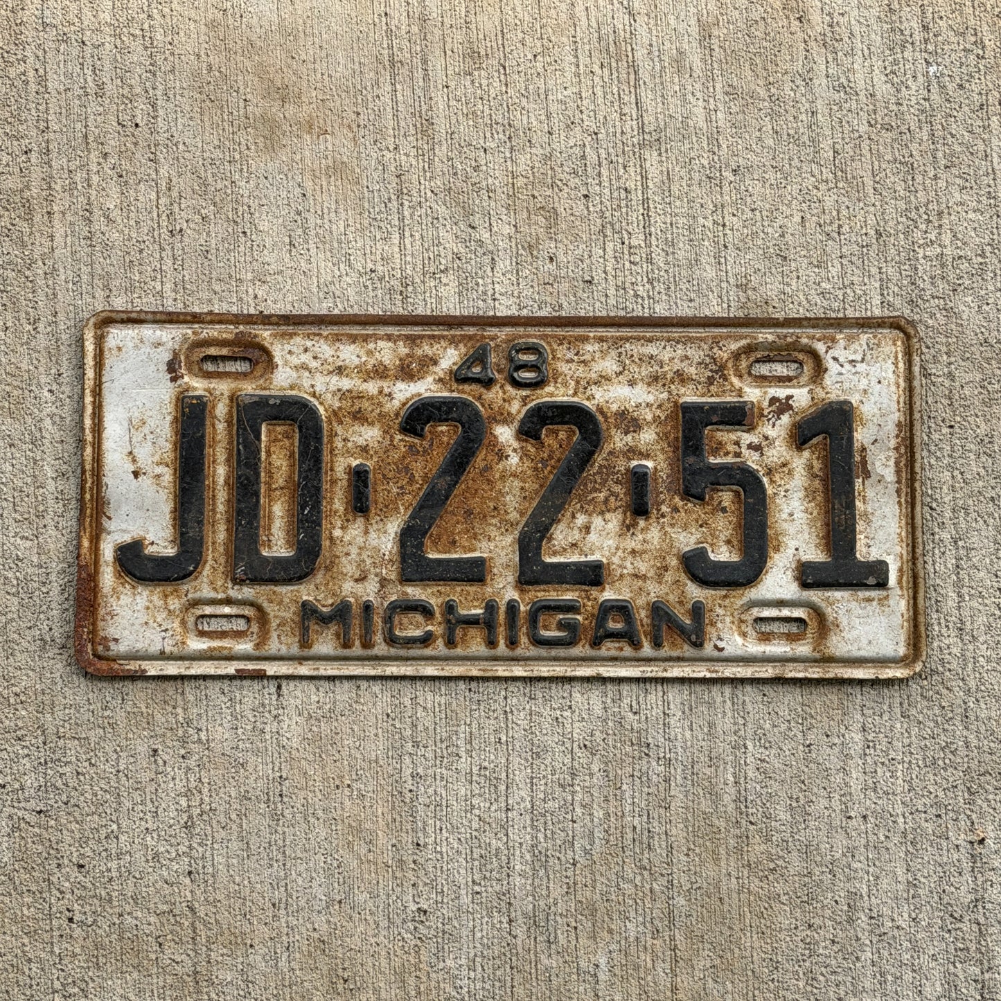 Photo of a 1948 Michigan License Plate Auto Tag Garage Decor Vintage JD 22 51 with original patina