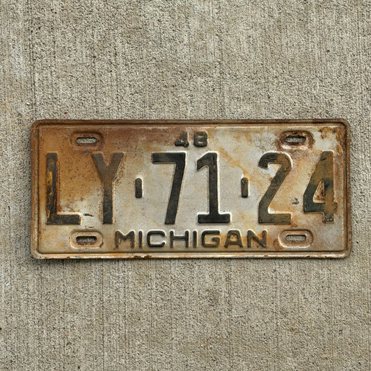 Photo of a 1948 Michigan License Plate Auto Tag Garage Decor Vintage LY 71 24 with original patina