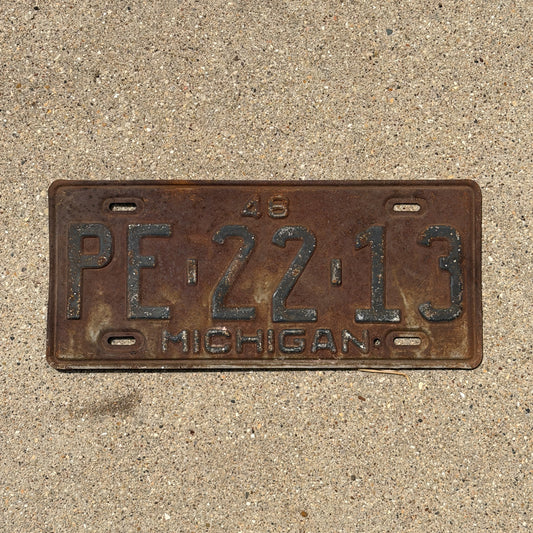 Photo of a 1948 Michigan License Plate Auto Tag Garage Decor Vintage PE 22 13 with original patina
