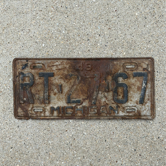 Photo of a 1948 Michigan License Plate Auto Tag Garage Decor Vintage RT 27 67 with original patina