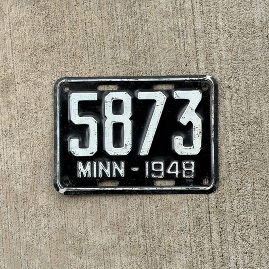 Photo of a 1948 Minnesota License Plate Auto Tag Garage Decor Vintage Low Number Four Digit 5873 with original patina