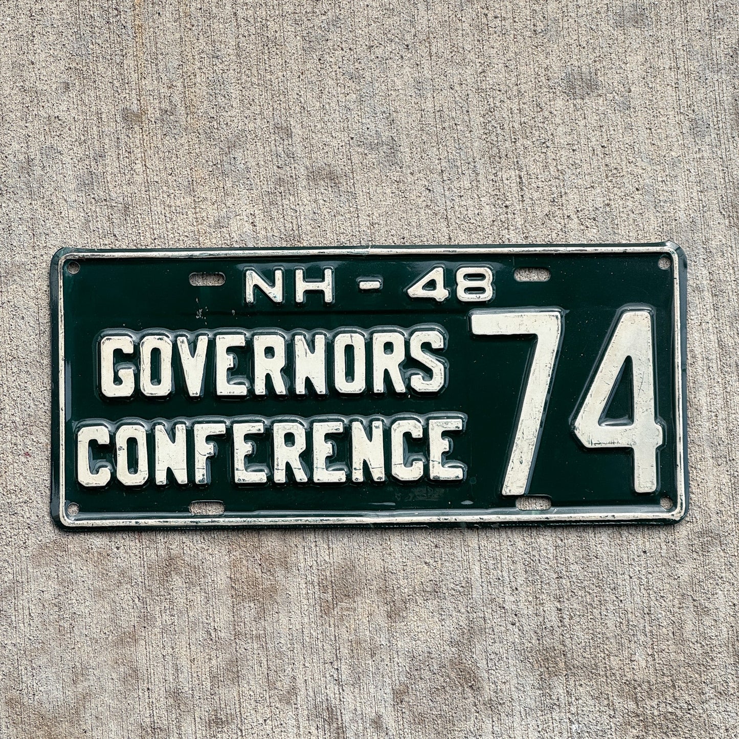 Photo of a 1948 New Hampshire License Plate Auto Tag Garage Decor Vintage 74 with original patina