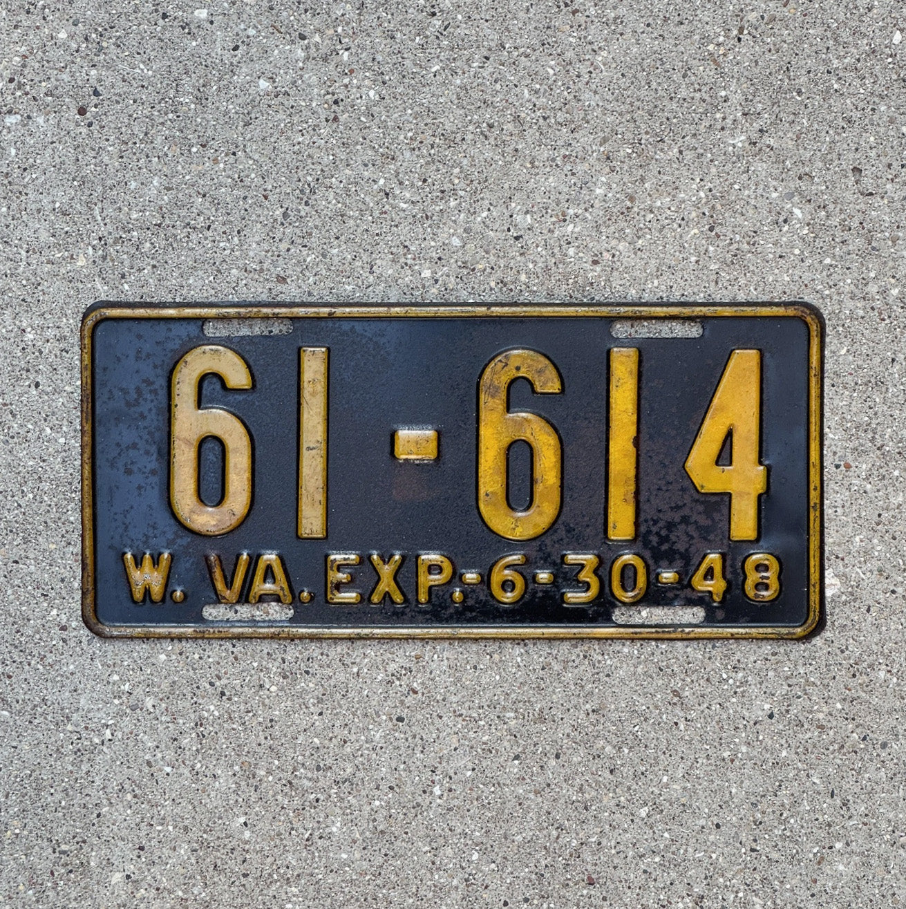 Photo of a 1948 West Virginia License Plate Auto Tag Garage Decor Vintage 61 614 with original patina
