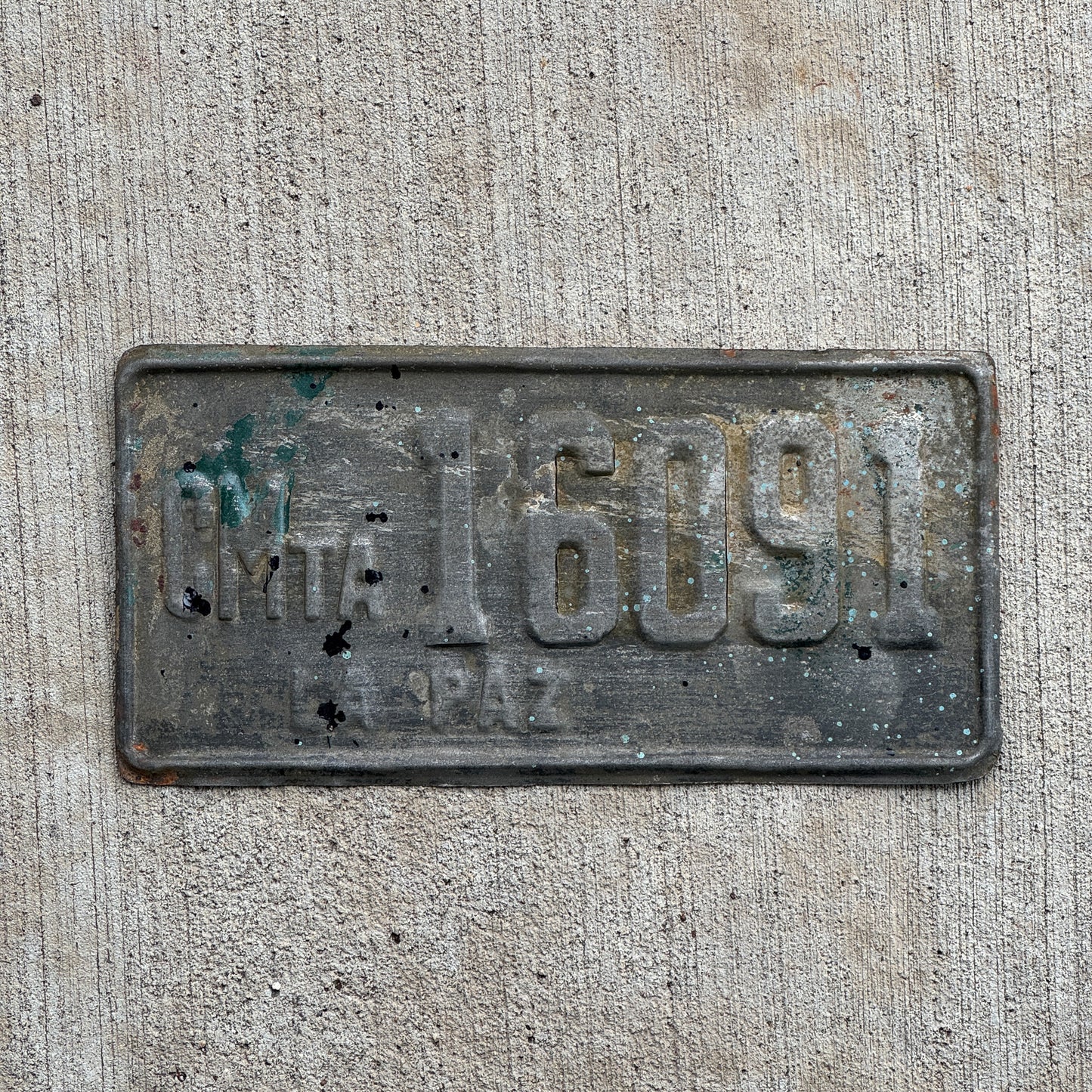 Photo of a 1949 Bolivia Commercial License Plate Auto Tag Garage Decor Vintage La Paz 16091 with original patina
