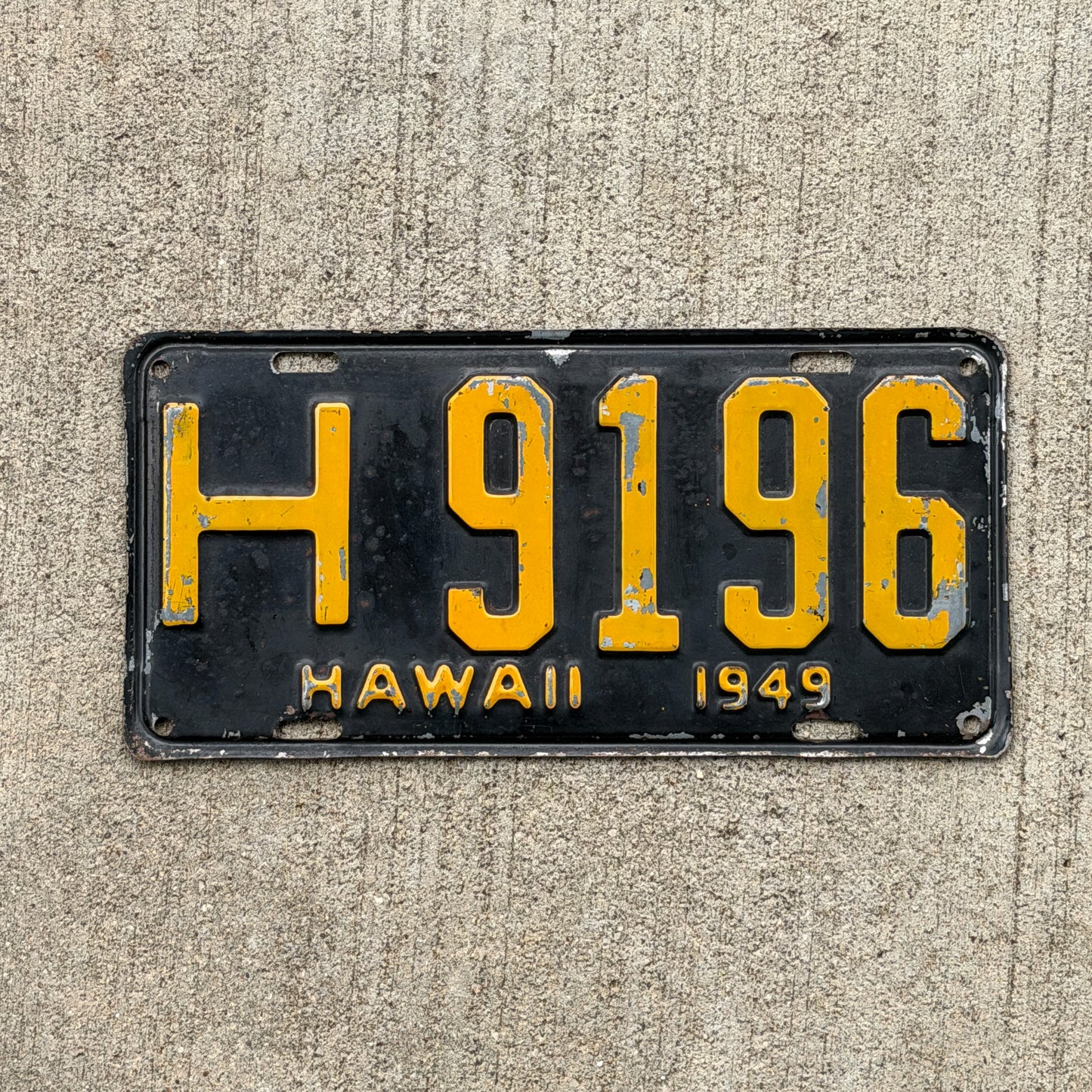 Photo of a 1949 Hawaii License Plate Auto Tag Garage Decor Vintage Honolulu County H 9196 with original patina