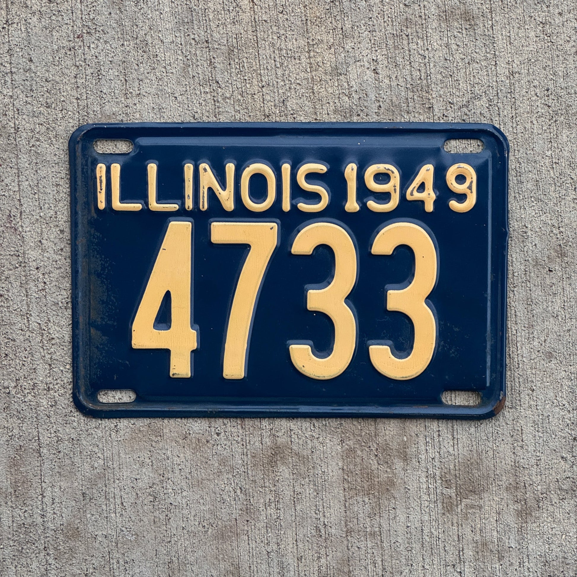 Photo of a 1949 Illinois License Plate Auto Tag Garage Decor Vintage Low Number Four Digit 4733 with original patina