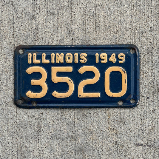 Photo of a 1949 Illinois Motorcycle License Plate Auto Tag Garage Decor Vintage Low Number Four Digit 3520 with original patina