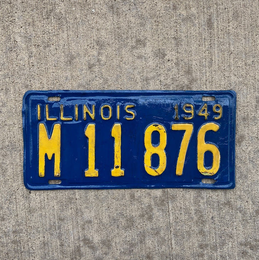 Photo of a 1949 Illinois Municipal License Plate Auto Tag Garage Decor Vintage Public Owned M 11876 with original patina