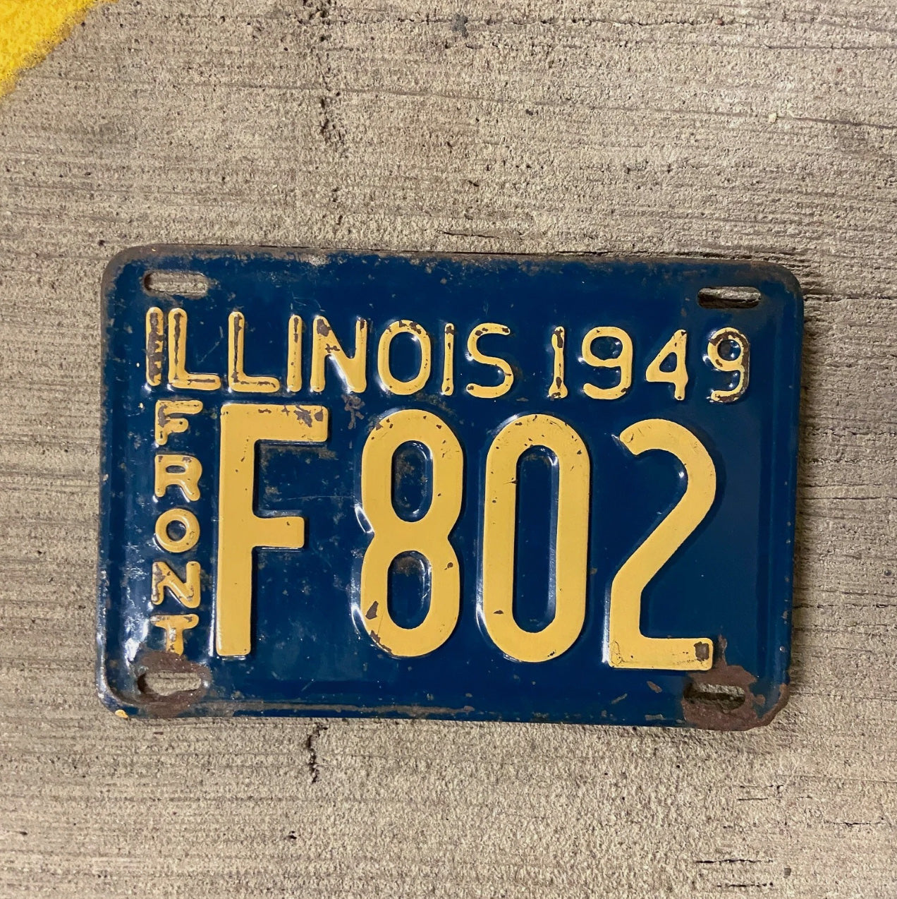 Photo of a 1949 Illinois Truck License Plate Auto Tag Garage Decor Vintage F 802 with original patina
