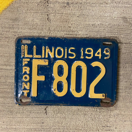 Photo of a 1949 Illinois Truck License Plate Auto Tag Garage Decor Vintage F 802 with original patina