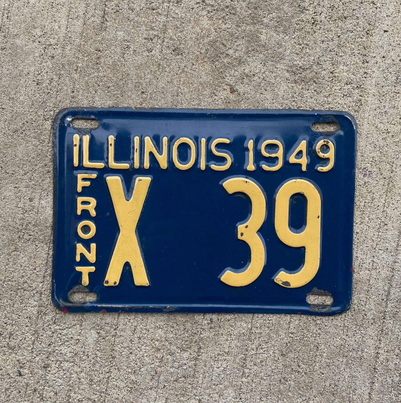 Photo of a 1949 Illinois Truck License Plate Auto Tag Garage Decor Vintage Low Number Two Digit X 39 with original patina