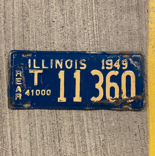 Photo of a 1949 Illinois Truck Mileage Tax License Plate Auto Tag Garage Decor Vintage Rear T 11360 with original patina