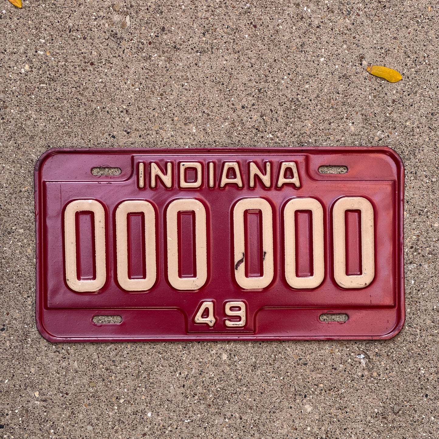 Photo of a 1949 Indiana Sample License Plate Auto Tag Garage Decor Vintage 000 000 with original patina