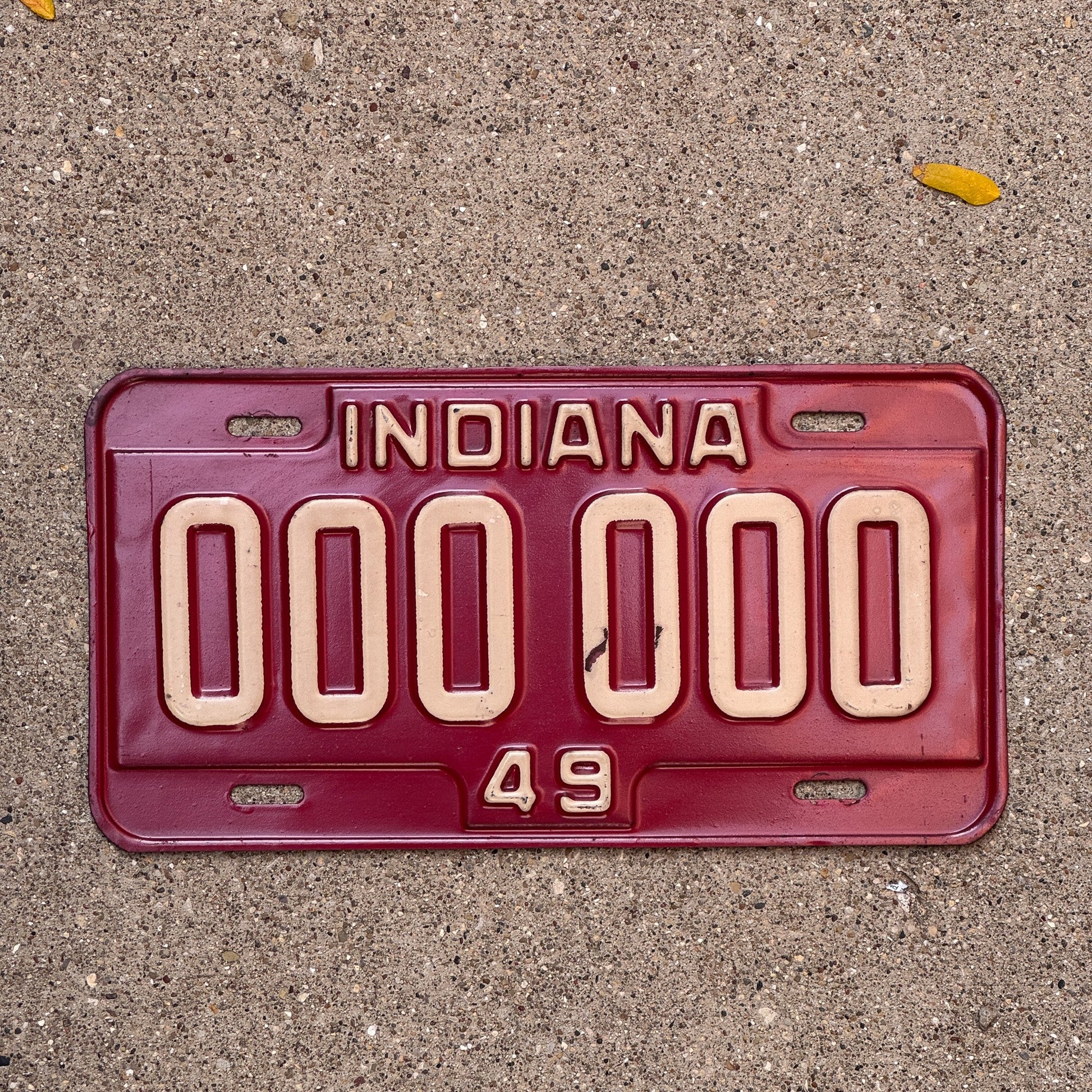 Photo of a 1949 Indiana Sample License Plate Auto Tag Garage Decor Vintage 000 000 with original patina