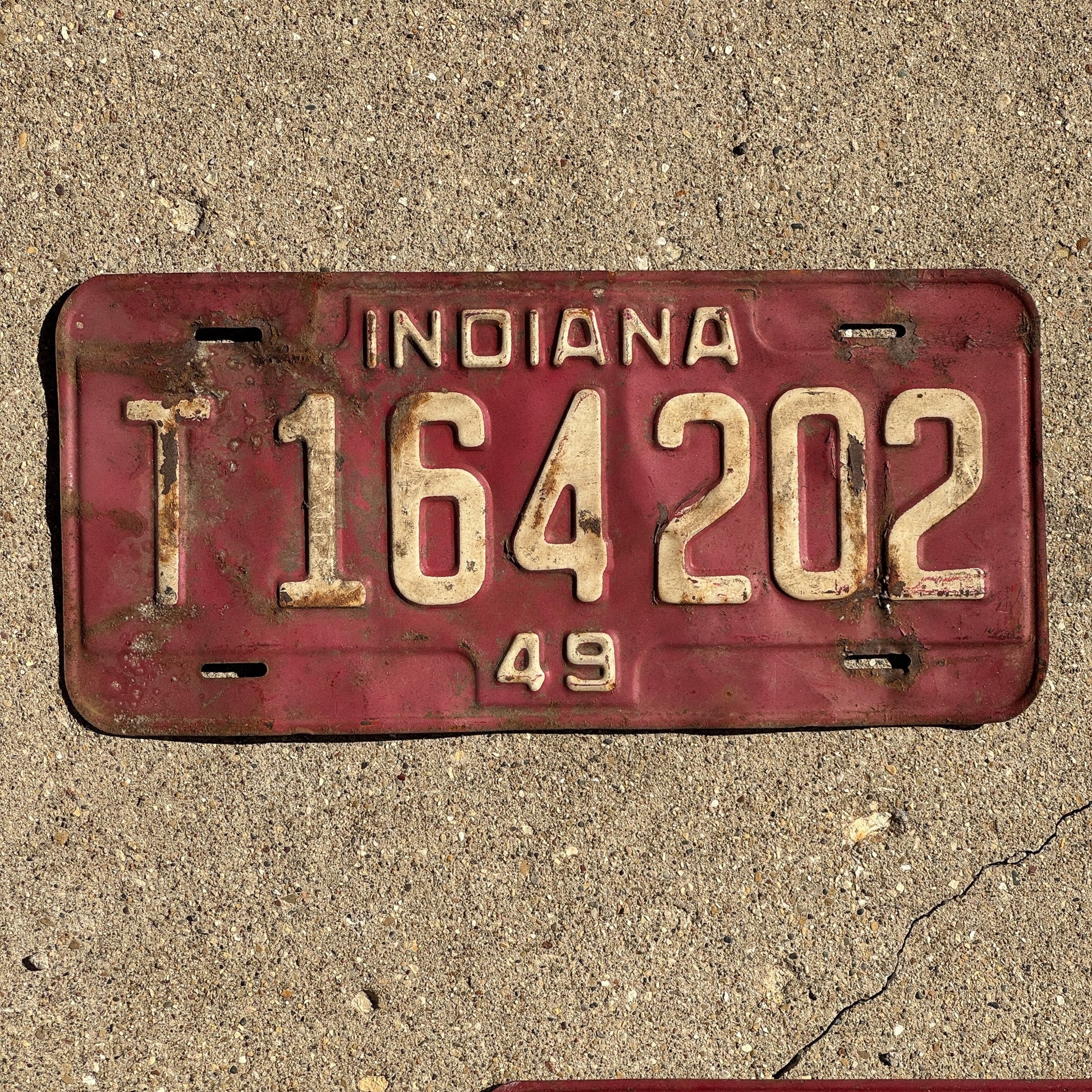 Photo of a 1949 Indiana TRUCK License Plate Auto Tag Garage Decor Vintage T 164 202