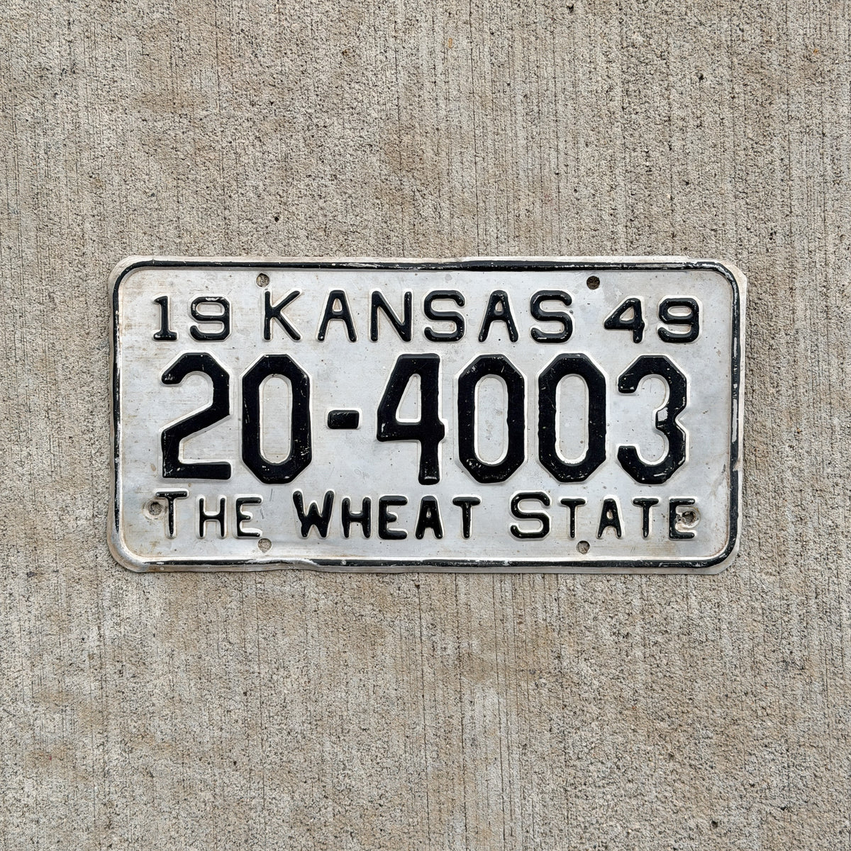 Photo of a 1949 Kansas License Plate Auto Tag Garage Decor Vintage 20 4003 with original patina