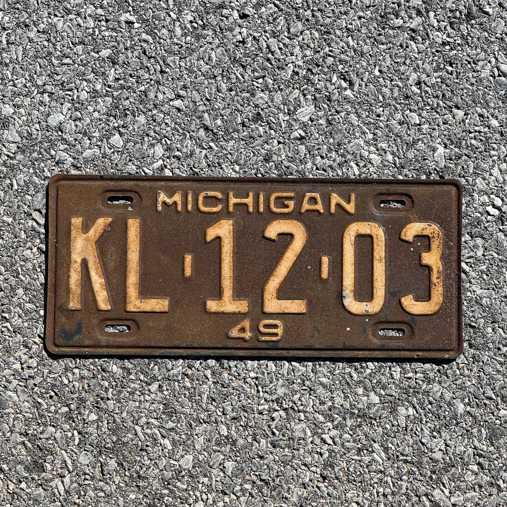 Photo of a 1949 Michigan License Plate Auto Tag Garage Decor Vintage KL1203