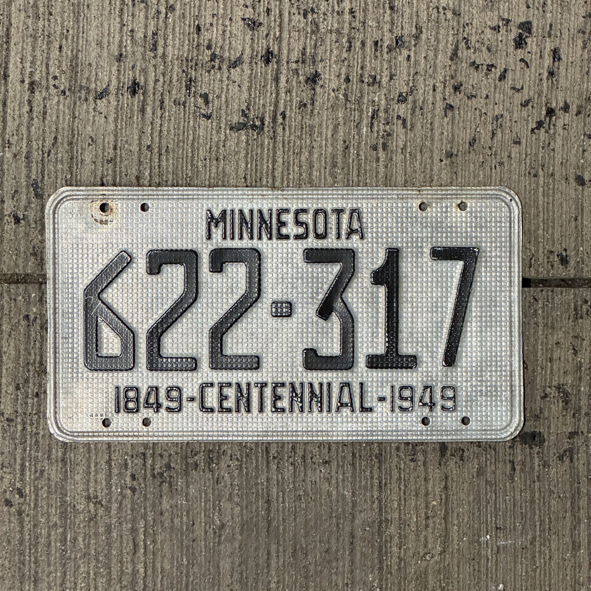 Photo of a 1949 Minnesota License Plate Auto Tag Garage Decor Vintage Waffle Design 622 317 with original patina