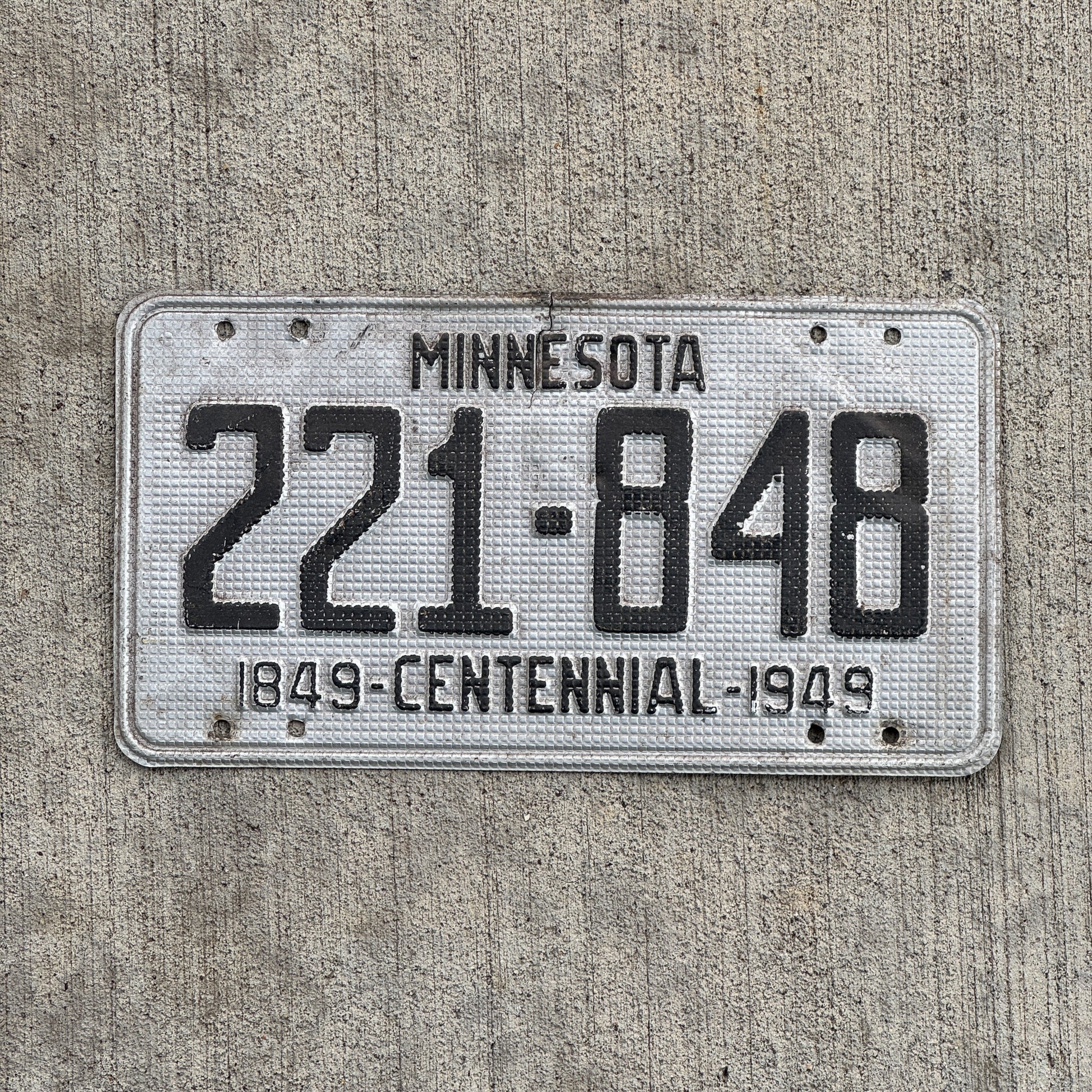 Photo of a 1949 Minnesota License Plate Auto Tag Garage Decor Vintage Waffle Style 221 848 with original patina