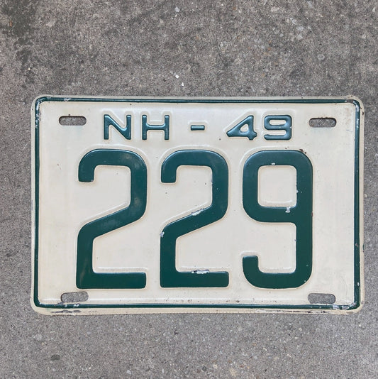Photo of a 1949 New Hampshire License Plate Auto Tag Garage Decor Vintage Low Number Three Digit 229 with original patina