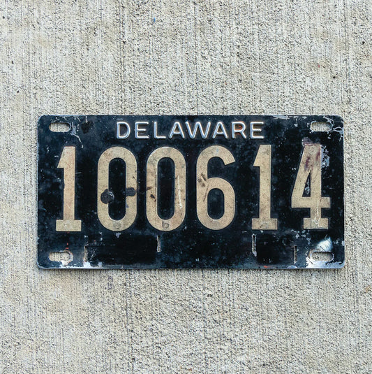 Photo of a 1950 Delaware License Plate Auto Tag Garage Decor Vintage Reflective Riveted Numbers 100614 with original patina