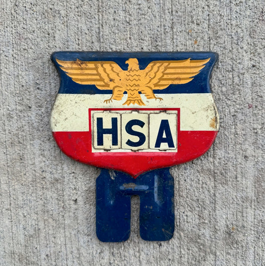 Photo of a 1950 Eagle Flag Shield License Plate Topper Auto Tag Garage Decor Vintage USA Americana American Patriotic HSA with original patina