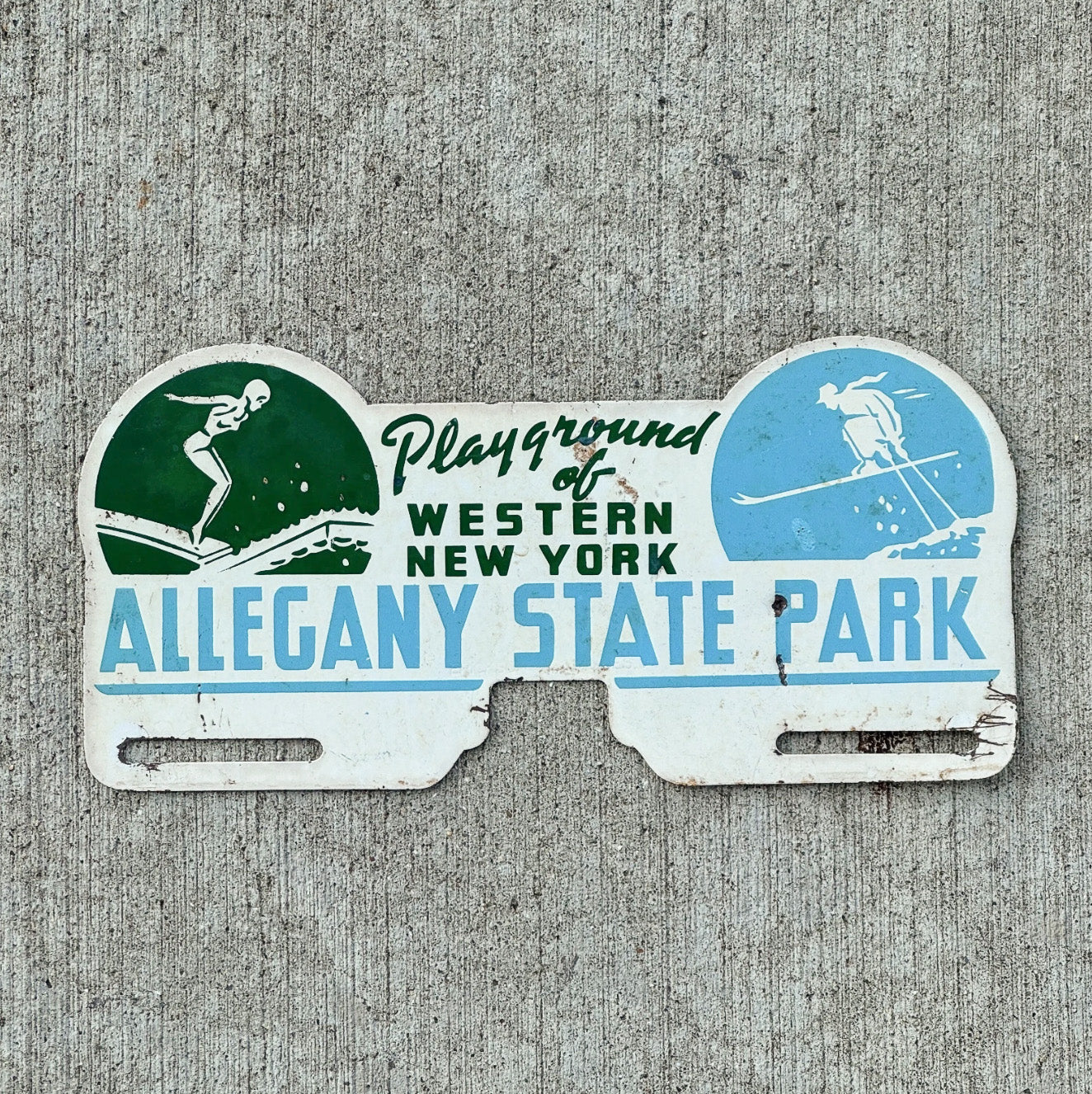 Photo of a 1950 Era Allegany State Park New York License Plate Topper Auto Tag Garage Decor Vintage Skiing Swimming with original patina
