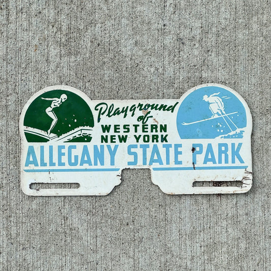 Photo of a 1950 Era Allegany State Park New York License Plate Topper Auto Tag Garage Decor Vintage Skiing Swimming with original patina