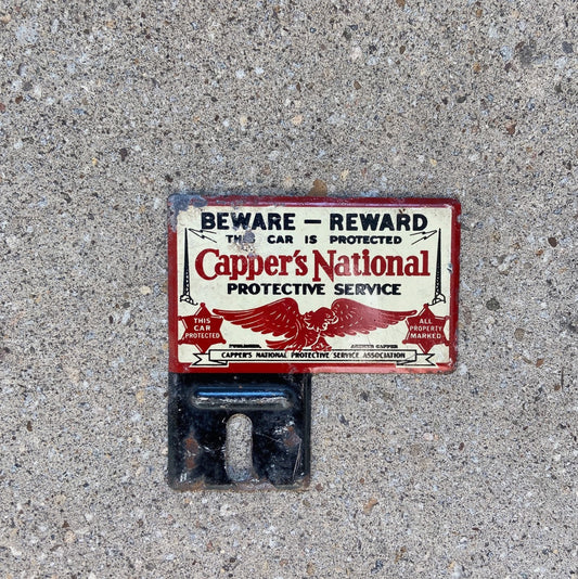 Photo of a 1950 Era Capper's National Insurance License Plate Topper Auto Tag Garage Decor Vintage Protected Eagle Small with original patina